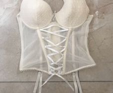 Cream corset with detachable suspenders