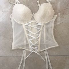 Cream corset with detachable suspenders