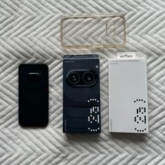 Near mint Nothing Phone 2(A)12gb ram 256gb storage bundle comes with used charger and phone case and brand new screen protector!