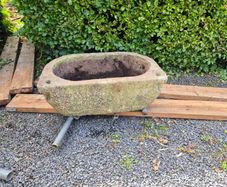 Trough, bathtub shaped.