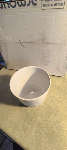 2 different itemes- 1-1960s Langley Sherwood Coffee Pot but stmpe been gone 60.00 euro.2- Ceramic Plant pot or vase 628/14 Made In Germany. 18.00 euro.