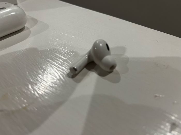 AirPods Pro 2 left earbud and case