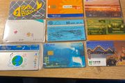 Collection of 10 vintage international phone cards