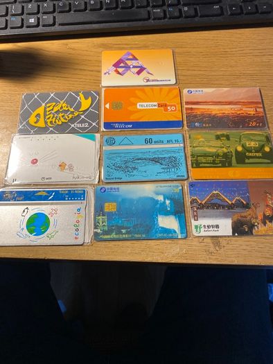 Collection of 10 vintage international phone cards