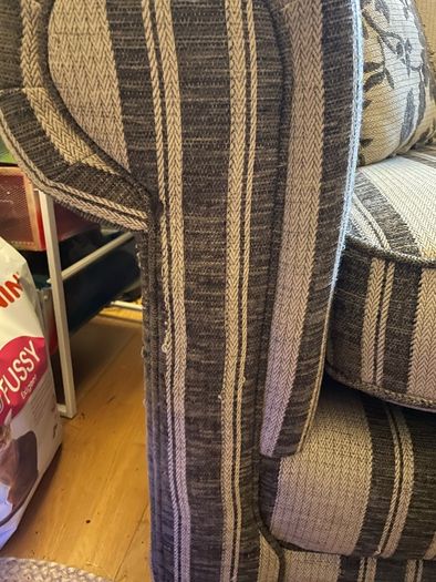 Beige and brown Couch with 2 cushions