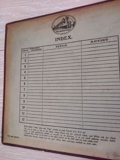 Antique book with 12 his master voice records