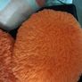 Fab fluffy orange cushions Image 2