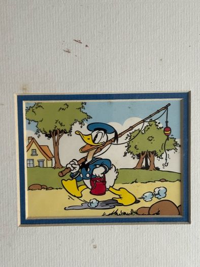 A Pair Of Sealed Mounted Vintage Donald Duck Prints