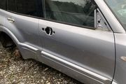 Mitsubishi Pajero 2006 front drivers side door with glass