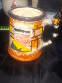 A Beautiful Old Collectable Ceramic tankard featuring characters from Charles Dickens novels Sam Weller and Sairey Gamp
