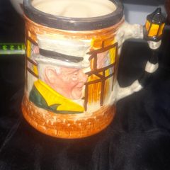 A Beautiful Old Collectable Ceramic tankard featuring characters from Charles Dickens novels Sam Weller and Sairey Gamp