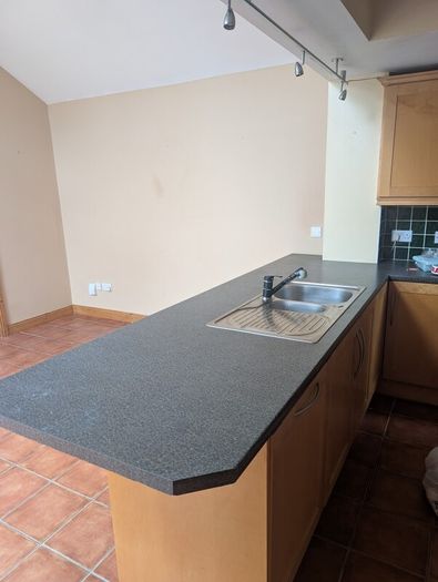 Entire Kitchen including Neff Double Oven, Integrated Fridge-Freezer, Bosch Dishwasher,  Faber Extractor fan, and Microwave.