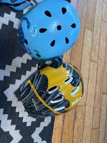 2 children's bike helmets.