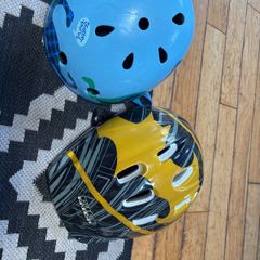 2 children's bike helmets.