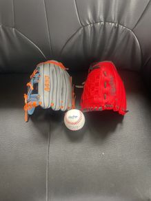 baseball gloves and ball