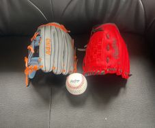 baseball gloves and ball