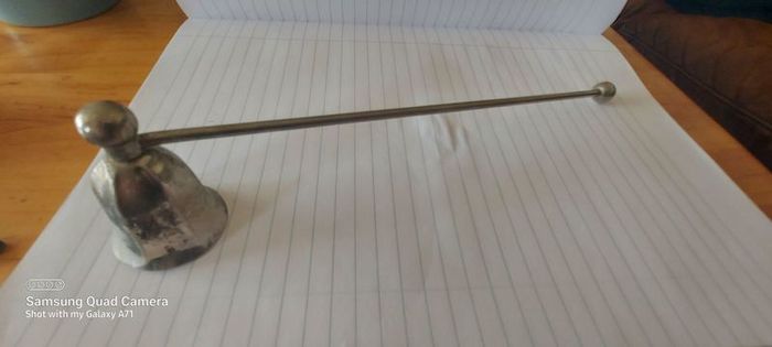 Candle metal snuffer ,,good patina for its age ,sold as seen
