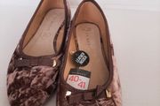 New flat shoes tag attached