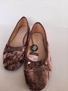 New flat shoes tag attached
