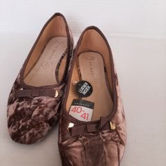 New flat shoes tag attached