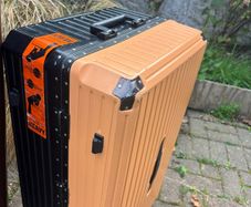 Suitcase one wheel broken