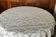 Circular Green Tablecloth with white lace overlay