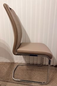 A set of 6 Dining room leather chairs with chrome frames