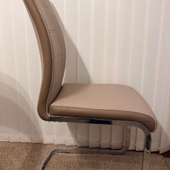 A set of 6 Dining room leather chairs with chrome frames