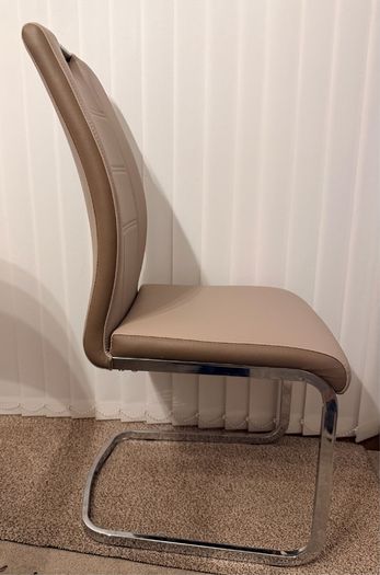 A set of 6 Dining room leather chairs with chrome frames