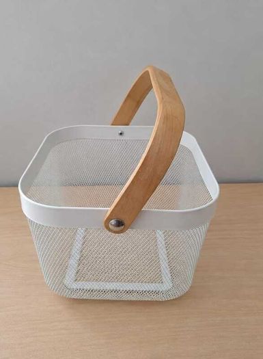 White wire storage basket with wooden handle