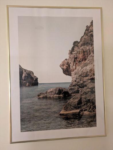 Framed art in gold frames