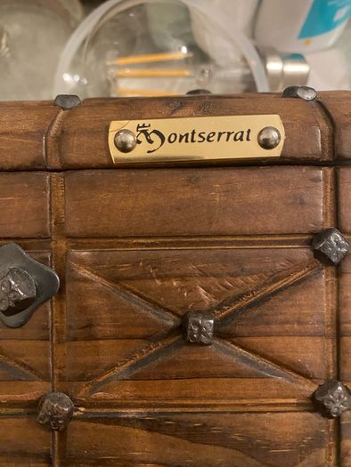 Antique  a wooden money  chest , having brass escutcheon and black metal hinges. 20cm x10