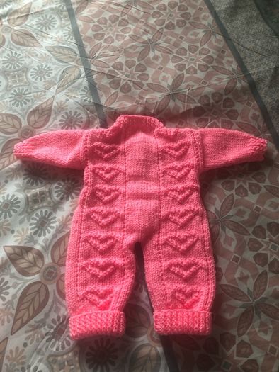 Baby onesie and matching hat with pompom