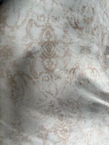 20 metre roll of blue/grey velvet with distressed French print in antique taupe upholstery fabric.