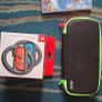Nintendo switch in box with acceseries and game Image 4