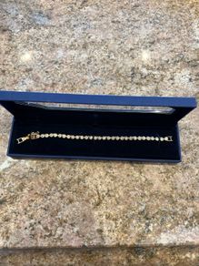 Swarovski gold tennis bracelet