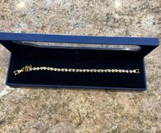 Swarovski gold tennis bracelet