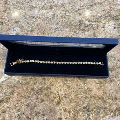 Swarovski gold tennis bracelet