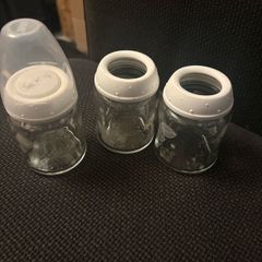 Breast pump, glass bottles and milk containers