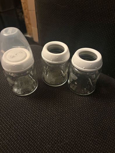 Breast pump, glass bottles and milk containers