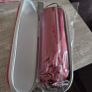 Umbrella with protective zip case. Burgundy/red colour, lightweight and easy to carry in a handbag or backpack. Brand new and unused. Image 3