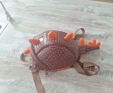 little life dinosaur backpack and hand strap