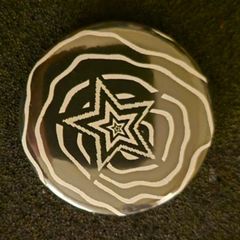 Star , pin back button badge.