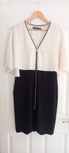 Cream/black dress with cape sleeves (french connection)