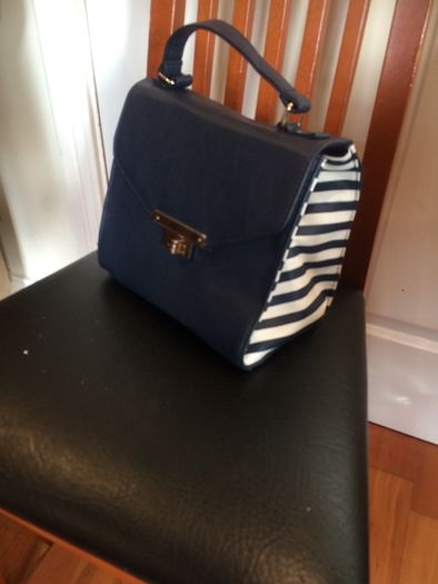 Hand bags. Rucksacks, clutch bags, purses