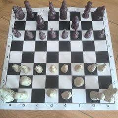 Andux Alice in Wonderland Chess Set with Leatherette Board & Wooden Box