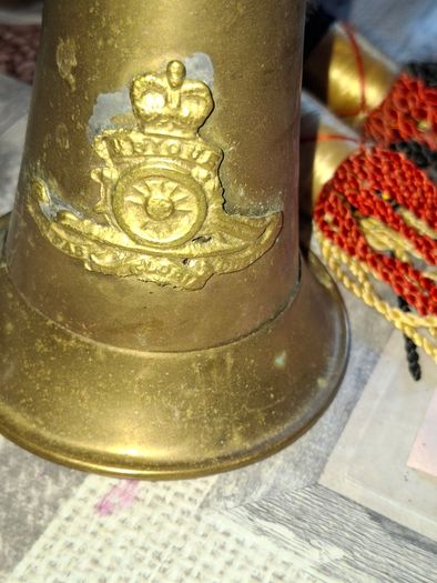 Antique Brass Military Bugle features a Distinctive Cap Badge