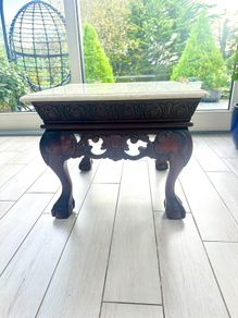 mahogany coffee table with beige marble top