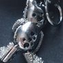 A fashionable, luxurious teddy bear keychain with marcasites. Image 7