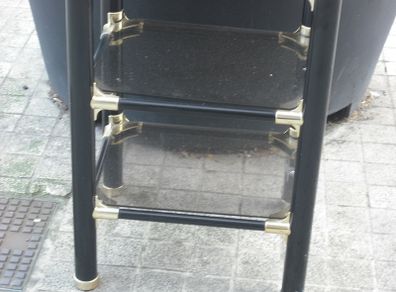 a 3 tier glass table iron frame